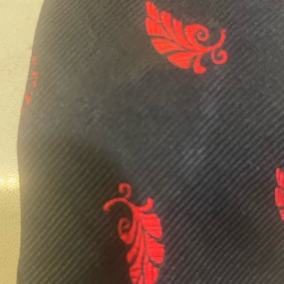 Quality Neckwear by Disney, Pinocchio’s Feather Silk tie Constructed By Tooke - Picture 2 of 5